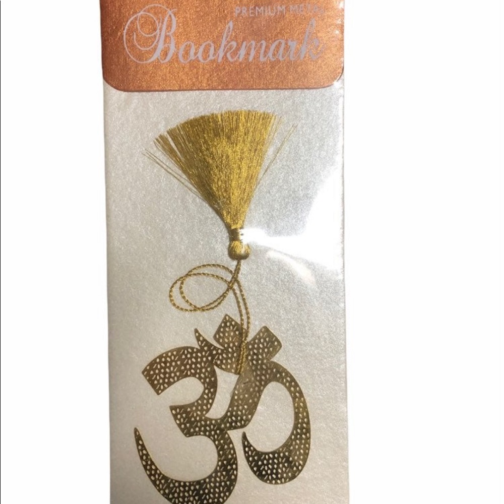 Gold metal bookmark ohm symbol